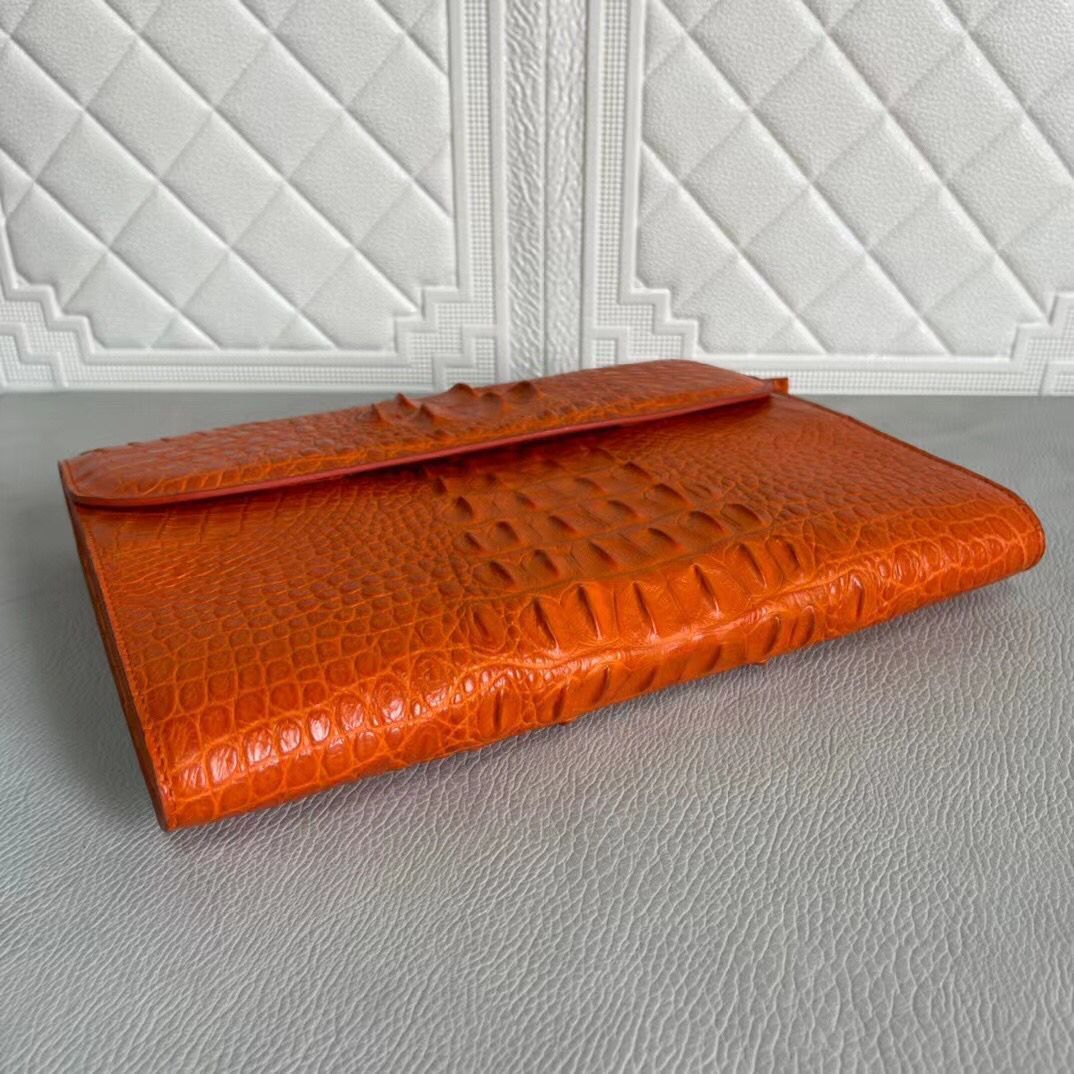 Women's genuine crocodile leather Rossie Viren clutch with card holder, featuring a sleek and textured design for elegant storage.