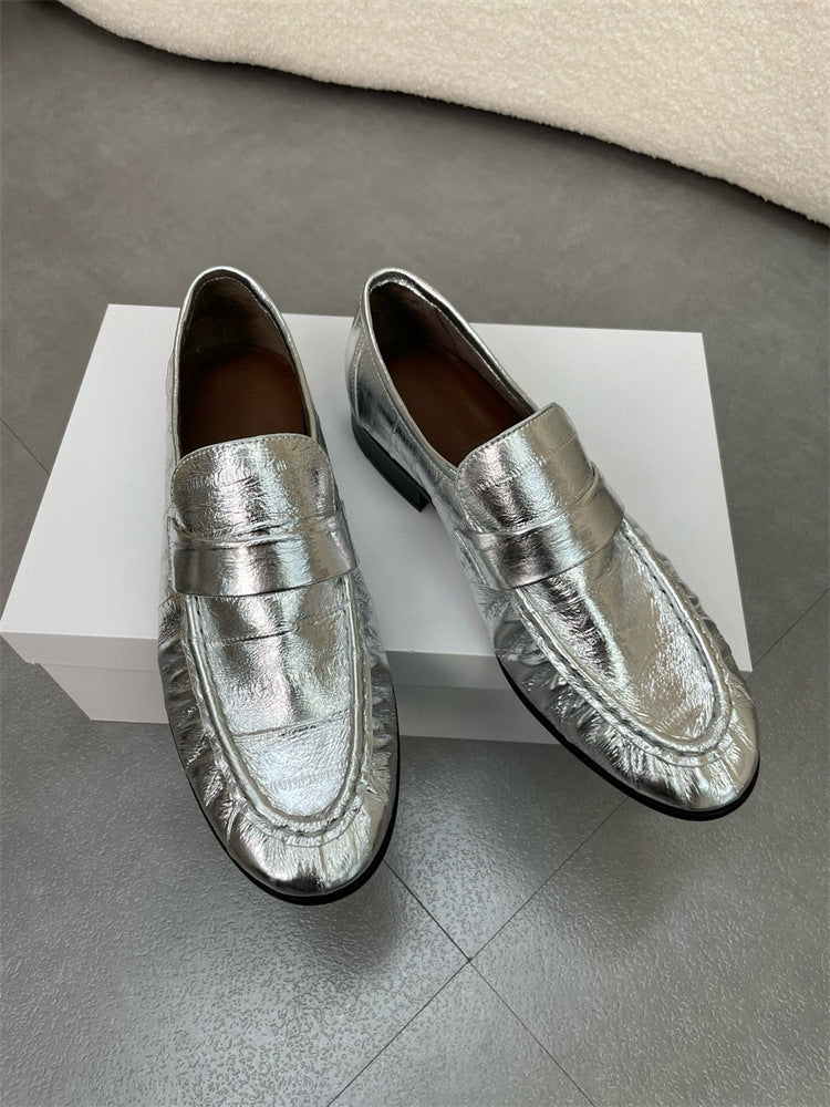 Eel skin loafers for women by Rossie Viren, featuring sleek design and smooth eel leather material.