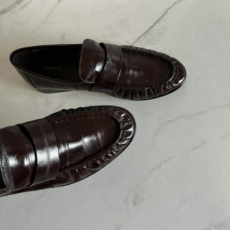 Rossie Viren eel skin loafers for women, stylish leather shoes with slip-on design and textured eel skin appearance.