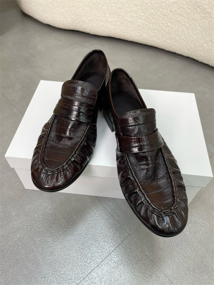 Rossie Viren eel skin women's loafers showing sleek, textured eel skin leather shoes with slip-on style and classic design.