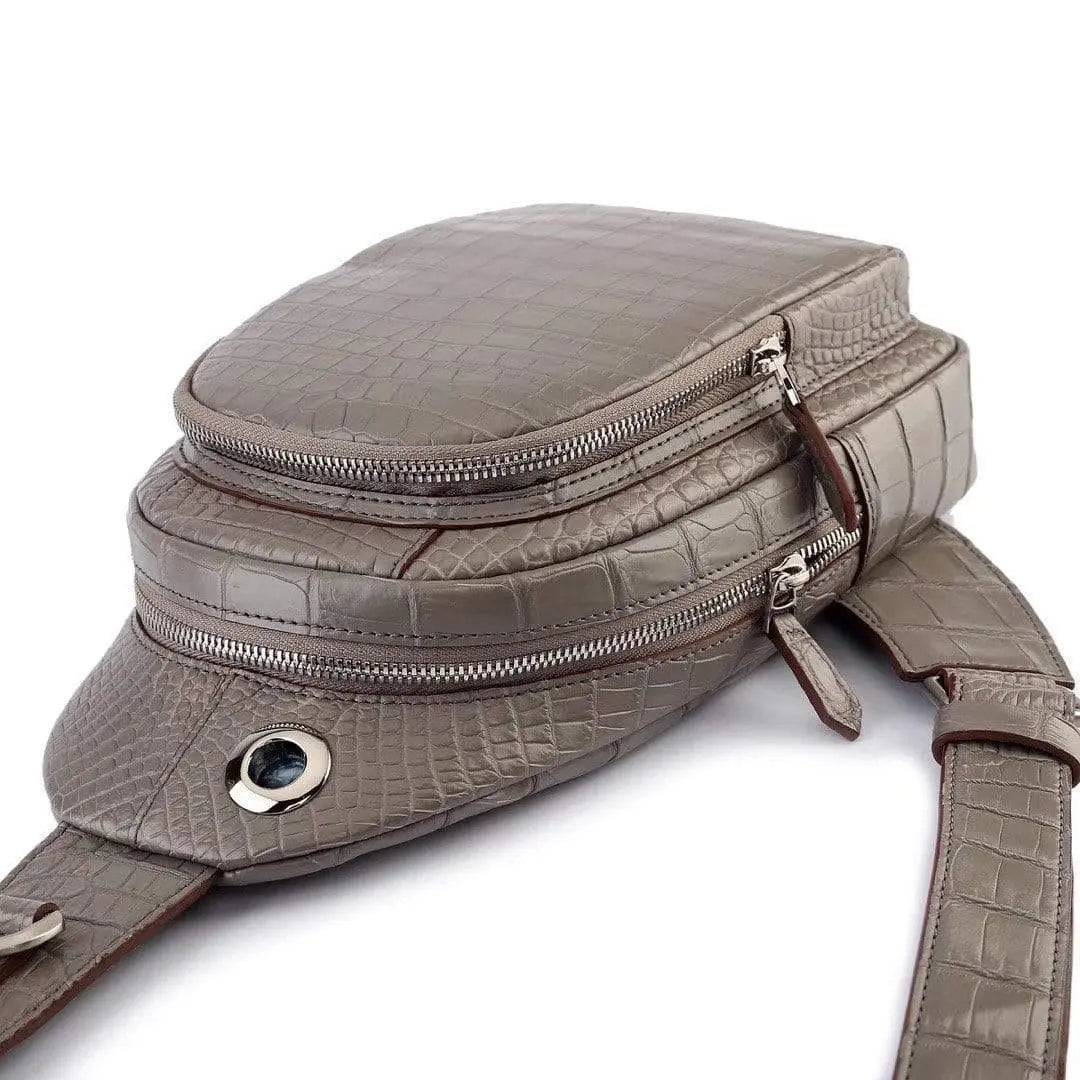 Rossie Viren crocodile leather men's sling chest bag with adjustable shoulder strap, suitable for travel and hiking.