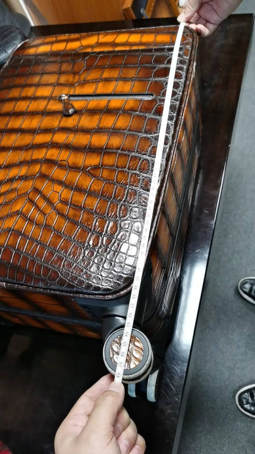 Vintage brown crocodile leather suitcase with wheels, Rossie Viren 20-inch trolley case for travel and weekend trips.