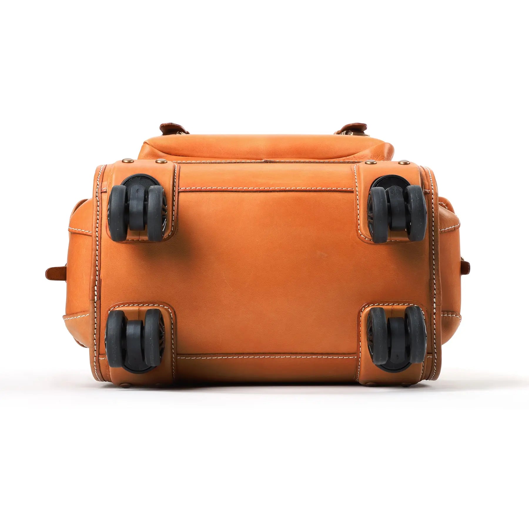 Vintage vegetable-tanned leather business rolling suitcase with universal wheels, 23-inch size, from Rossie Viren.