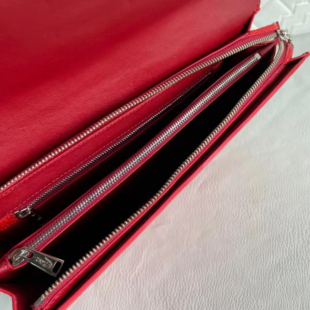 Rossie Viren women's genuine crocodile leather clutch with card holder, featuring a sleek, textured crocodile pattern and compact design.