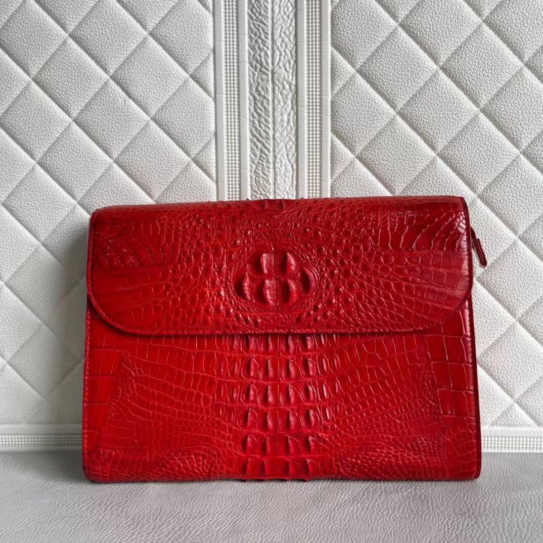 Women's genuine crocodile leather clutch by Rossie Viren, featuring a sleek card holder design with textured crocodile pattern.